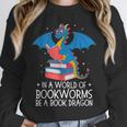 In A World Full Of Bookworms Be A Book Dragon Reading Unisex Sweatshirt