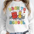 Back To School Checkered Book Pencil Groovy Teacher Student Unisex Sweatshirt