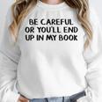 Be Careful Or You’Ll End Up In My Book Unisex Sweatshirt Be Careful Or You’Ll End Up In My Book Unisex Sweatshirt