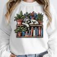 Cosy Sloth In Bookshelf With Plants Unisex Sweatshirt