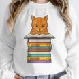 Cute Orange Tabby Cat Reading On Pile Of Books Unisex Sweatshirt