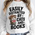 Easily Distracted By Cats And Books Lovers Reading Unisex Sweatshirt Easily Distracted By Cats And Books Lovers Reading Unisex Sweatshirt