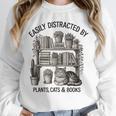 Easily Distracted By Plants Cats & Books Planting Gardening Unisex Sweatshirt Easily Distracted By Plants Cats & Books Planting Gardening Unisex Sweatshirt