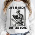 Life Is Short Buy The Book Skeleton Book Lover Reading Unisex Sweatshirt Life Is Short Buy The Book Skeleton Book Lover Reading Unisex Sweatshirt