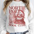 North Pole Book Club Christmas Unisex Sweatshirt North Pole Book Club Christmas Unisex Sweatshirt