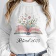 Quote New Chapter Begins Retired 2025 Floral Open Book Unisex Sweatshirt Quote New Chapter Begins Retired 2025 Floral Open Book Unisex Sweatshirt