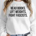 Read Books Lift Weights Fight Fascists Premium Tri-Blend Unisex Sweatshirt