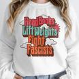 Read Books Lift Weights Fight Fascists Reading No Kings Premium Tri-Blend Unisex Sweatshirt