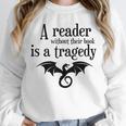 A Reader Without Their Book Is A Tragedy Dragon Rider Unisex Sweatshirt