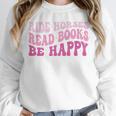 Ride Horses Read Books Be Happy Groovy Book Horse Premium Unisex Sweatshirt Ride Horses Read Books Be Happy Groovy Book Horse Premium Unisex Sweatshirt