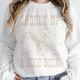 Saddle Up With a Good Book Cowgirl Western Women Vintage Unisex Sweatshirt Saddle Up With a Good Book Cowgirl Western Women Vintage Unisex Sweatshirt