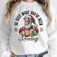 He Sees What You'Ve Been Reading Santa Xmas Book Lover Unisex Sweatshirt He Sees What You'Ve Been Reading Santa Xmas Book Lover Unisex Sweatshirt