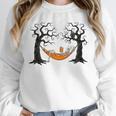 Skeleton Reading Book In Hammock Halloween Reader Unisex Sweatshirt