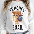 Teacher Snail With Glasses On Books Cute Pre-K Kindergarten Unisex Sweatshirt Teacher Snail With Glasses On Books Cute Pre-K Kindergarten Unisex Sweatshirt
