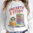 Unearth A Story Cute Turtle Reading Books Librarian Unisex Sweatshirt Unearth A Story Cute Turtle Reading Books Librarian Unisex Sweatshirt