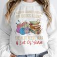A Woman Cannot Survive On Books Alone She Needs Yarn Crochet Premium Tri-Blend Unisex Sweatshirt