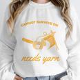 Woman Survives On Books Yarn Knitting Crochet Premium Tri-Blend Unisex Sweatshirt Woman Survives On Books Yarn Knitting Crochet Premium Tri-Blend Unisex Sweatshirt
