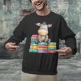 Adorable Donkey With Heart Sitting On Colorful Book Stack Unisex Sweatshirt