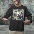 Bigfoot With Alien Reading A Book Bigfoot And UFO Unisex Sweatshirt