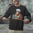 Bigfoot Reading a Cookbook Unisex Sweatshirt