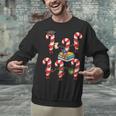 Bookmas Christmas Books Shirt Candy Cane Bookworm Unisex Sweatshirt Bookmas Christmas Books Shirt Candy Cane Bookworm Unisex Sweatshirt