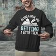 Buying A Book And Getting A Little Treat Unisex Sweatshirt