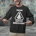 Caution Slippery When Reading Book Lover Unisex Sweatshirt