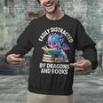 Easily Distracted By Dragons And Books Unisex Sweatshirt