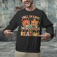 Fall In Love With Reading Autumn Pumpkin Teacher Book Lover Unisex Sweatshirt Fall In Love With Reading Autumn Pumpkin Teacher Book Lover Unisex Sweatshirt
