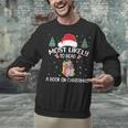 Most Likely To Read A Book On Christmas Love Reading Books Unisex Sweatshirt