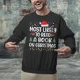 Most Likely To Read A Book On Christmas Matching Family Xmas Unisex Sweatshirt