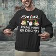 Most Likely To Read A Book On Christmas Snowman Family Unisex Sweatshirt Most Likely To Read A Book On Christmas Snowman Family Unisex Sweatshirt