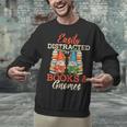 Reading Gnomes Cute Easily Distracted By Books And Gnomes Unisex Sweatshirt