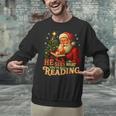 He Sees What You’Ve Been Reading Santa Book Lover Christmas Unisex Sweatshirt