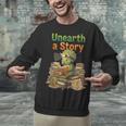 Unearth a Story Triceratops Dinosaur Reading Books Cute Dino Unisex Sweatshirt