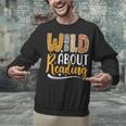Wild About Reading Lover Bookworm Library Teacher Zoo Animal Unisex Sweatshirt Wild About Reading Lover Bookworm Library Teacher Zoo Animal Unisex Sweatshirt