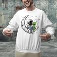 Astronaut Reading Book To Alien Moon Space Astronomy Unisex Sweatshirt