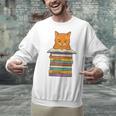 Cute Orange Tabby Cat Reading On Pile Of Books Unisex Sweatshirt