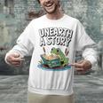 Unearth a Story Frog Reading a Book Summer 2026 Premium Tri-Blend Unisex Sweatshirt Unearth a Story Frog Reading a Book Summer 2026 Premium Tri-Blend Unisex Sweatshirt