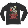 Staying Alive One Book At A Time Skeleton Reading Librarian Unisex Long Sleeve T-Shirt