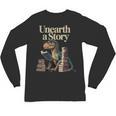 Unearth A Story Dinosaur Reading a Library Book Unisex Long Sleeve T-Shirt Unearth A Story Dinosaur Reading a Library Book Unisex Long Sleeve T-Shirt