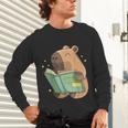 Pet Capybara Is Reading Library Capy Word Book Day Teacher Men Women Kids Unisex Long Sleeve T-Shirt Pet Capybara Is Reading Library Capy Word Book Day Teacher Men Women Kids Unisex Long Sleeve T-Shirt