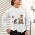 Carve Out Time To Read Halloween Ghost Books Raglan Baseball Tee Unisex Long Sleeve T-Shirt