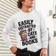 Easily Distracted By Cats And Books Lovers Reading Unisex Long Sleeve T-Shirt Easily Distracted By Cats And Books Lovers Reading Unisex Long Sleeve T-Shirt