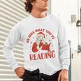 He Sees What You'Ve Been Reading Santa Book Unisex Long Sleeve T-Shirt