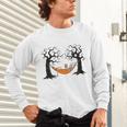 Skeleton Reading Book In Hammock Halloween Reader Unisex Long Sleeve T-Shirt