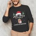 Most Likely To Read A Book On Christmas Love Reading Books Unisex Long Sleeve T-Shirt Most Likely To Read A Book On Christmas Love Reading Books Unisex Long Sleeve T-Shirt