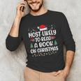 Most Likely To Read A Book On Christmas Matching Family Xmas Unisex Long Sleeve T-Shirt Most Likely To Read A Book On Christmas Matching Family Xmas Unisex Long Sleeve T-Shirt