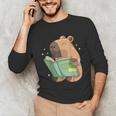 Pet Capybara Is Reading Library Capy Word Book Day Teacher Men Women Kids Unisex Long Sleeve T-Shirt Pet Capybara Is Reading Library Capy Word Book Day Teacher Men Women Kids Unisex Long Sleeve T-Shirt