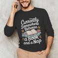 Somewhere Between a Book And a Nap – Cozy Reading Unisex Long Sleeve T-Shirt Somewhere Between a Book And a Nap – Cozy Reading Unisex Long Sleeve T-Shirt